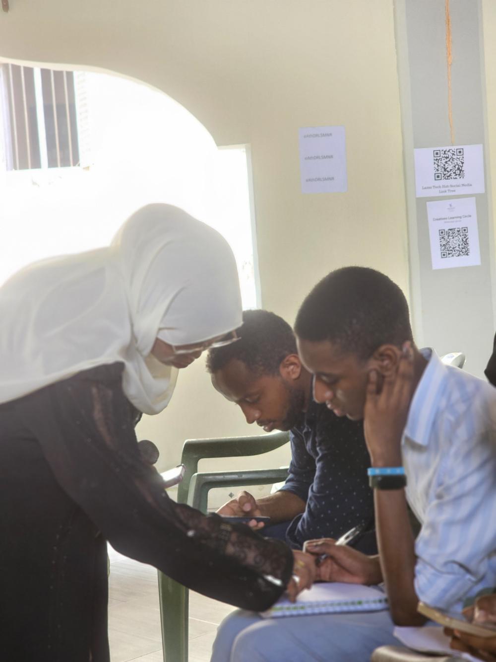 Mentor helping a young learner