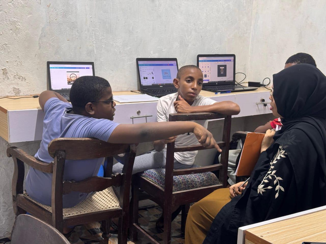 Students learning on laptops at Lamu Tech Hub